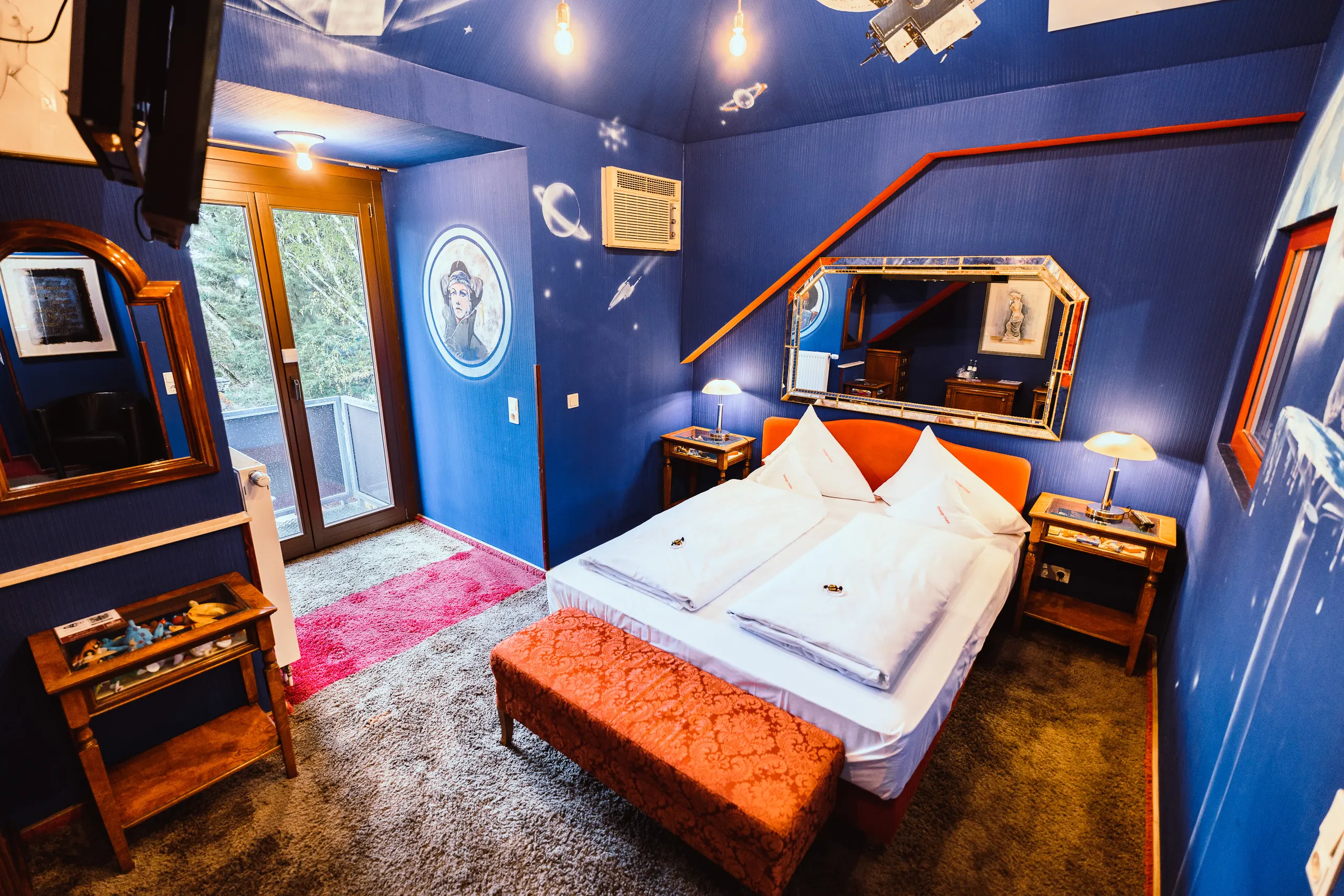 A space-themed look and seemingly endless expanses in the “Future 2000” themed room.